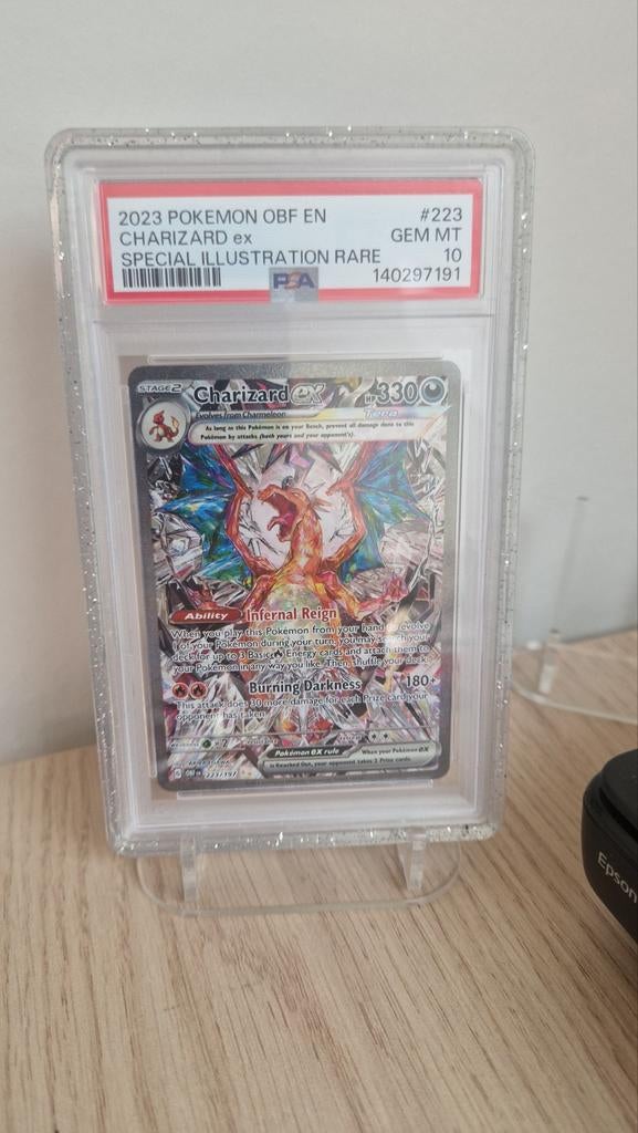 2023 Pokemon OBF EN Charizard ex #223 SIR PSA10, Ophalen of Verzenden, Zo goed als nieuw