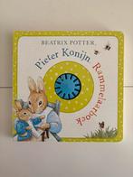 Beatrix Potter Pieter Konijn / Rammelaarboek, Ophalen of Verzenden, Zo goed als nieuw, 6 tot 12 maanden