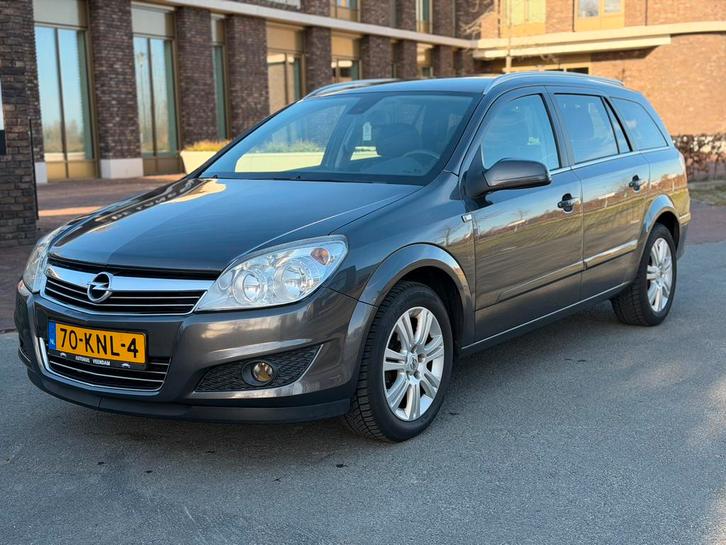Opel Astra 1.6 16V 85KW St.wgn. 2010 Grijs, Auto's, Opel, Bedrijf, Astra, Benzine, C, Stationwagon, Handgeschakeld, Origineel Nederlands