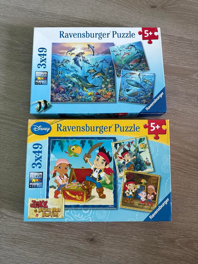 Ravensburger Puzzels 3x49 stukjes - Dolfijnen & Jake, Ophalen, 10 tot 50 stukjes, Zo goed als nieuw, 6 jaar of ouder