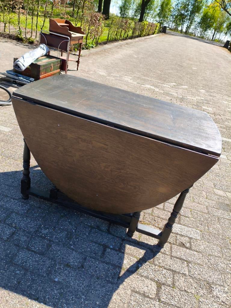 Antieke inklapbare hangoor eettafel., Ophalen