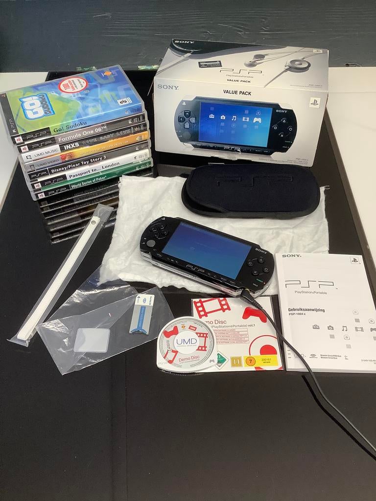 Sony PSP-1004 value pack in originele doos + veel spellen., Ophalen of Verzenden, Zo goed als nieuw