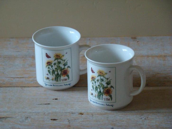 2x Mok Janneke Brinkman ZONNEBLOEMEN, zo goed als nieuw, Huis en Inrichting, Keuken | Servies, Zo goed als nieuw, Kop(pen) en/of Schotel(s)