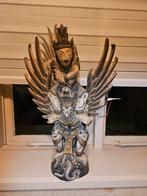 Houten Garuda Beeld, Ophalen
