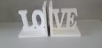 2 boekensteunen wit Love, Ophalen of Verzenden, Zo goed als nieuw