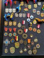 carnavalsmedailles, Ophalen