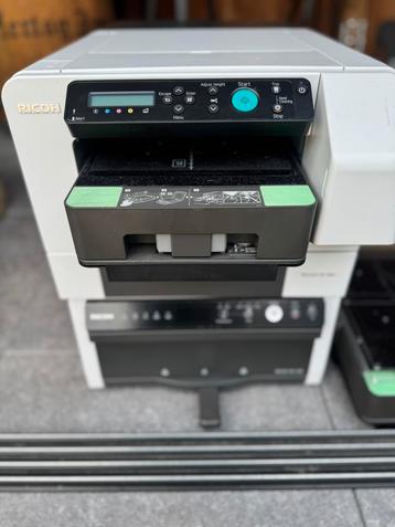 Ricoh RI 100 DTG Printer + RI 100h Press Textielbedrukking beschikbaar voor biedingen