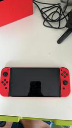 Nintendo Switch OLED Mario Red Edition + 4 games en 2 tassen, Met games, Zo goed als nieuw, Met 1 controller, Switch OLED