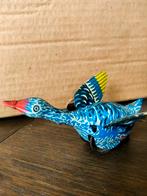 Blikken speelgoed vogel, Ophalen