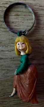 Oude sleutelhanger van een vrouw die haar voet laat zien, Ophalen, Gebruikt, Knuffel of Figuurtje