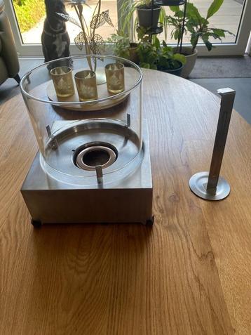 Mooie RVS sfeerhaard met glas beschikbaar voor biedingen