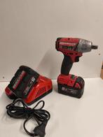 Te koop Milwaukee slagmoersleutel met 2 accus en lader, Ophalen of Verzenden, Gebruikt, Boor- en Schroefmachine