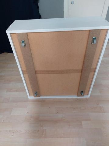 Bedlade met wieltjes. 60cm breed, 66,5 cm diep, wit beschikbaar voor biedingen