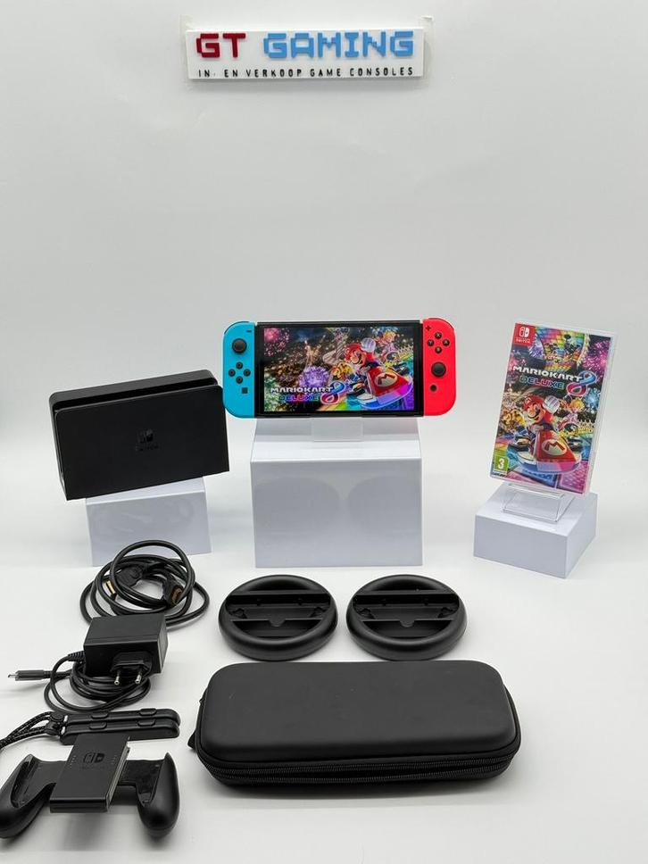 OLED NINTENDO 2024+GARANTIE+ MARIO KART+STUURTJES MEGA PACK, Spelcomputers en Games, Spelcomputers | Nintendo Switch, Zo goed als nieuw