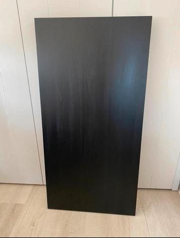 Zwart bureau blad van Ikea beschikbaar voor biedingen