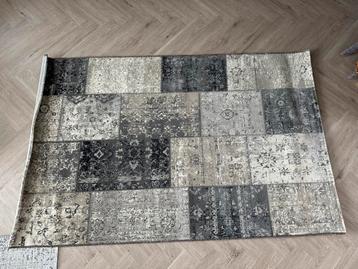 Vintage patchwork vloerkleed beschikbaar voor biedingen
