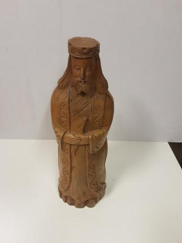 Houten beeld met verborgen ruimte voor een fles. beschikbaar voor biedingen