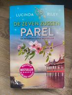 Lucinda Riley - Parel - De zeven zussen, Boeken, Romans, Ophalen of Verzenden, Gelezen