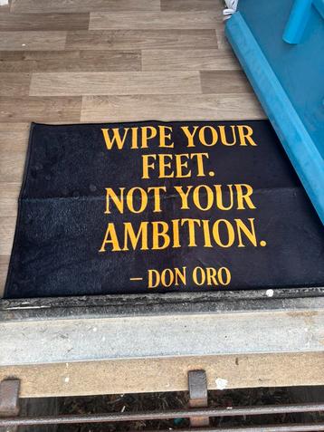 Don Oro deurmat Wipe your feet.Not your ambition. Zwart/goud beschikbaar voor biedingen