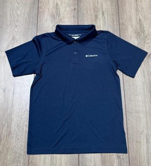 Als nieuw: donkerblauwe polo Columbia omni shade mt M (10-12, Kinderen en Baby's, Kinderkleding | Maat 140, Zo goed als nieuw