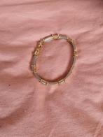 Elegante zilver- en goudkleurige armband, Ophalen of Verzenden, Nieuw, Zilver, Zilver