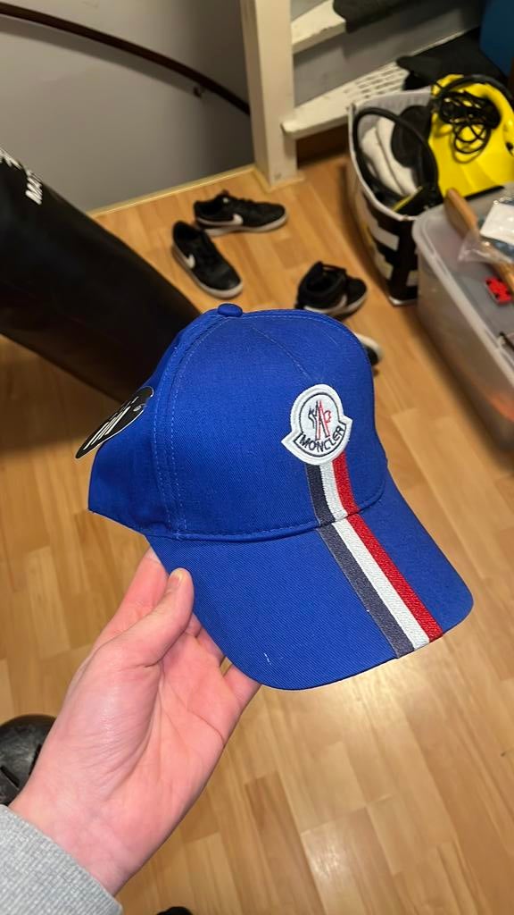 Moncler pet blauw, Ophalen of Verzenden, Zo goed als nieuw
