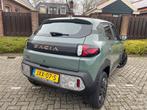 Dacia Spring Extreme 65 26.8 kWh NIEUWSTAAT NAVI AIRCO CRUIS, Stof, Gebruikt, 4 stoelen, Origineel Nederlands