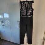 Mooi zwart jumpsuit met zilverkleurige versiering, Kleding | Dames, Jumpsuits, Ophalen of Verzenden, Zo goed als nieuw, Maat 38/40 (M)