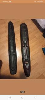 Houten handgesneden maskers, Ophalen