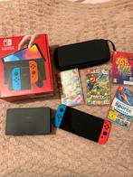 Nintendo Switch OLED Rood/Blauw + Games!, Spelcomputers en Games, Games | Nintendo Switch, Overige genres, Eén computer, Ophalen of Verzenden