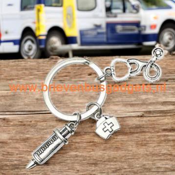 Sleutelhanger Arts, Verpleegster, Stethoscoop, Injectie beschikbaar voor biedingen