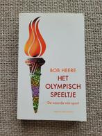 Boek Het Olympisch Speeltje - Bob Heere, Ophalen of Verzenden, Zo goed als nieuw, Balsport