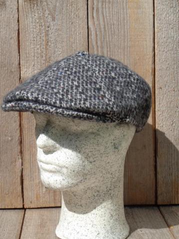 Gemêleerde zwarte wollen pet van Hatland maten S,M,L,XL,XXL beschikbaar voor biedingen