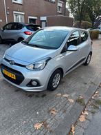 Hyundai i10 1.0 5DR 2015 Grijs, Auto's, Hyundai, Euro 5, Stof, Zwart, 4 stoelen