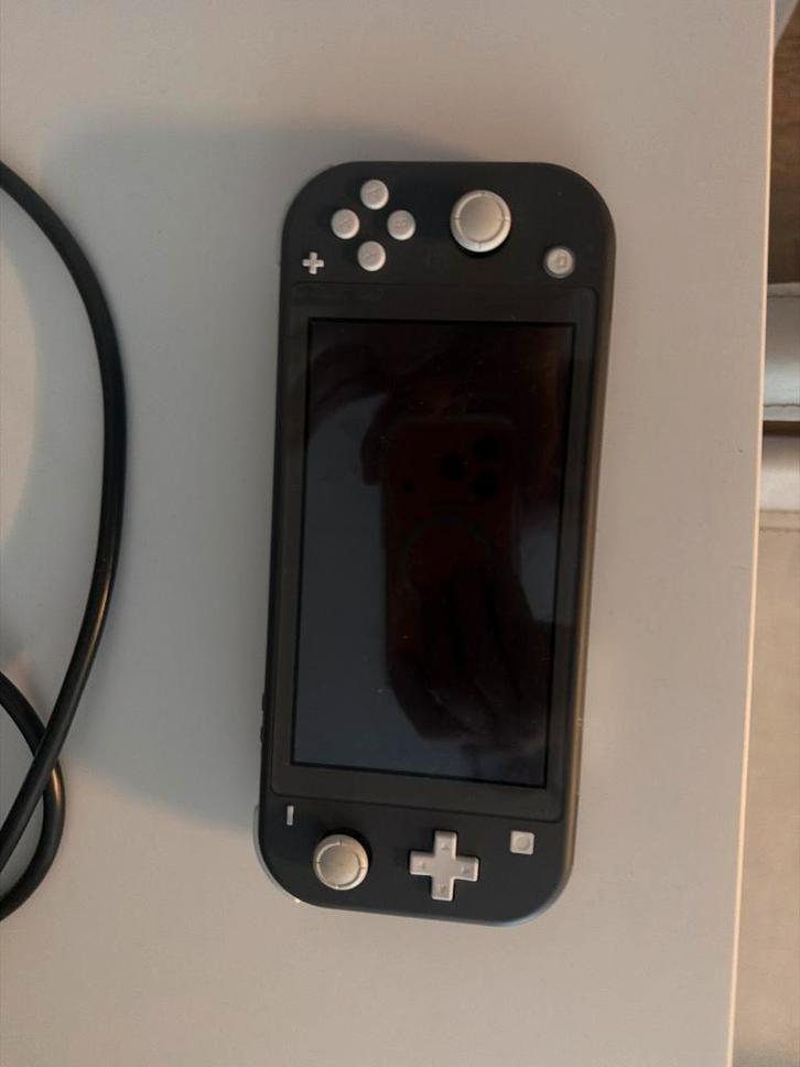 Nintendo Switch Lite - Grijs, Spelcomputers en Games, Games | Nintendo Switch, Zo goed als nieuw, Overige genres, 1 speler, Vanaf 7 jaar