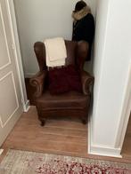 Leren fauteuil, Ophalen
