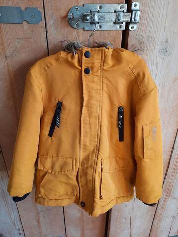 Primark Okergele Winterjas Geel met Capuchon Maat 104 beschikbaar voor biedingen