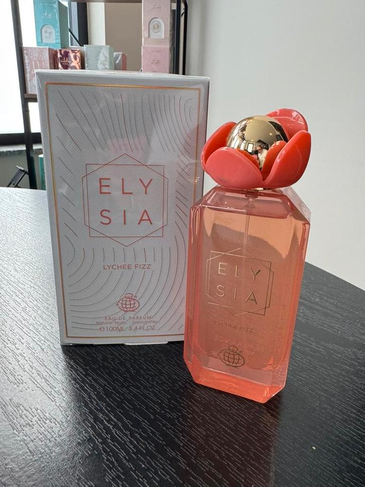 Fragrance World Elysia Lychee Fizz 100ml Eau de Parfum, Sieraden, Tassen en Uiterlijk, Uiterlijk | Parfum, Nieuw, Ophalen of Verzenden
