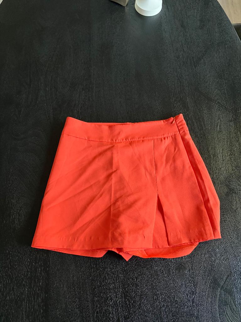 Oranje skort in maat L, zo goed als nieuw, Maat 42/44 (L), Copperose, Oranje, Ophalen of Verzenden