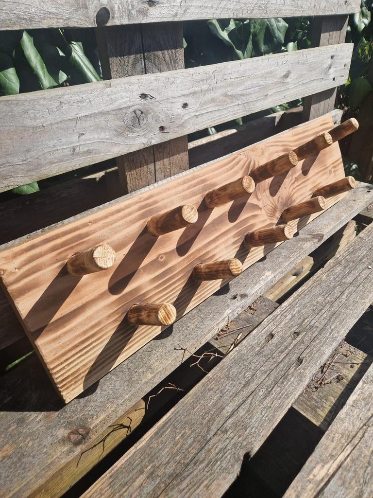 Kapstok van hout, Ophalen