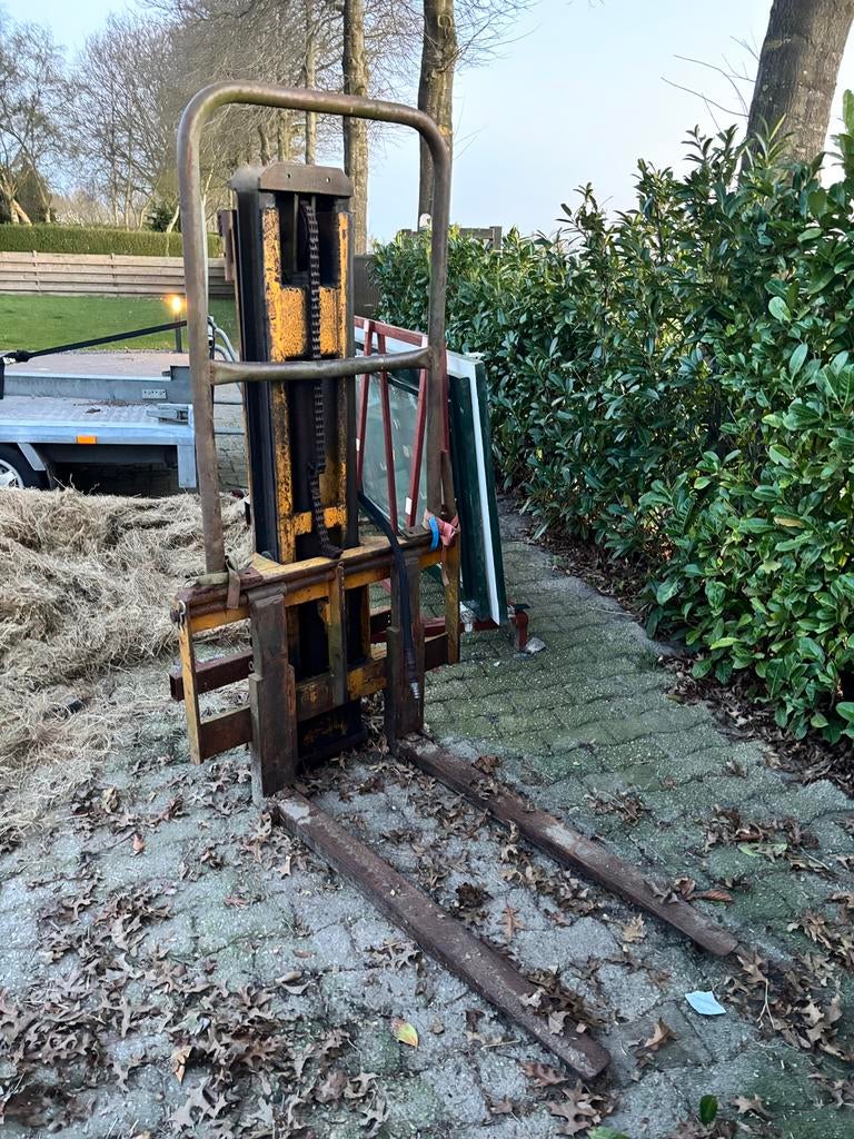 Hefmast voor minitraktor, Ophalen