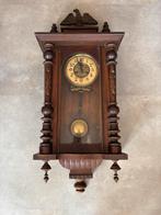 Antieke wandklok met adelaar, Ophalen