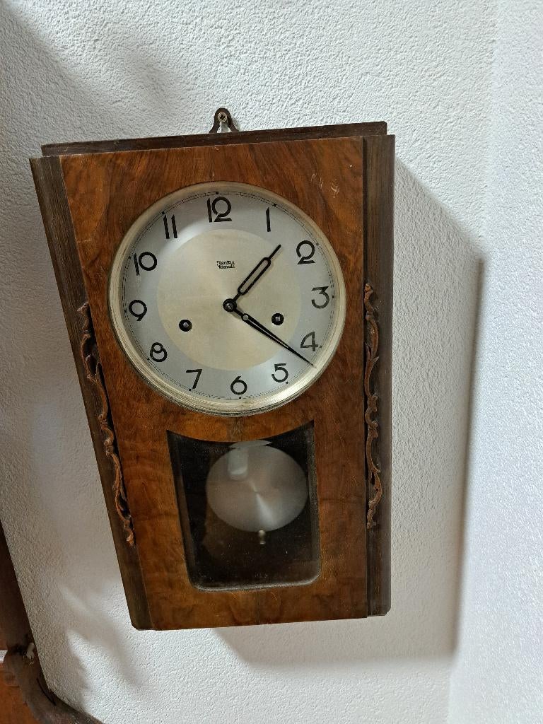 Wandklok met Kienzle uurwerk, Ophalen