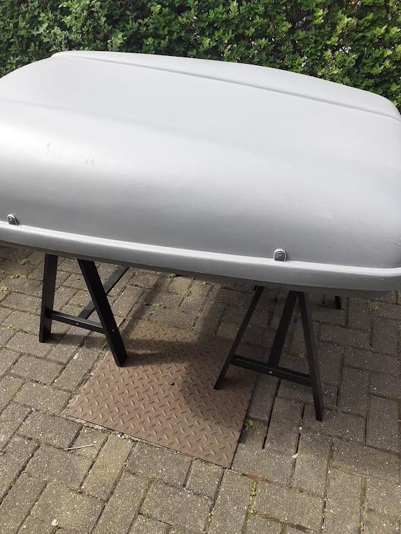 dak koffer, Ophalen, Zo goed als nieuw