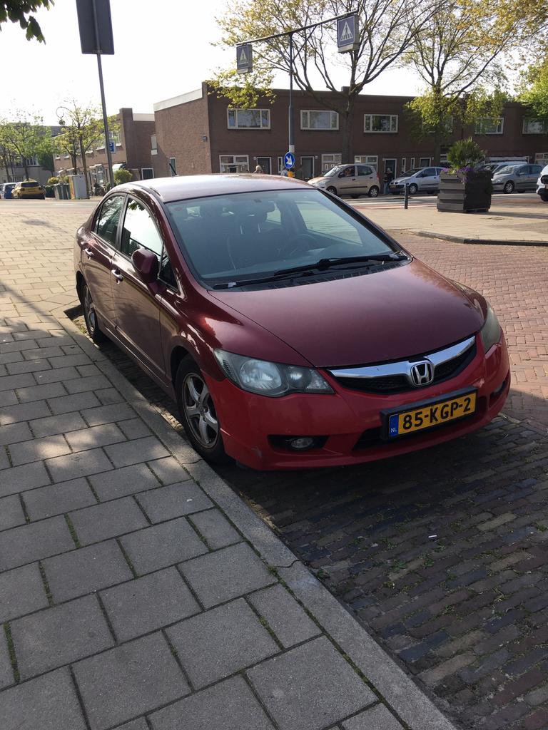Honda Civic 1.3 Vtec Hybrid 4DR C-tr. 2009 Rood, Auto's, Honda, Origineel Nederlands, Grijs, 22 km/l, Sedan