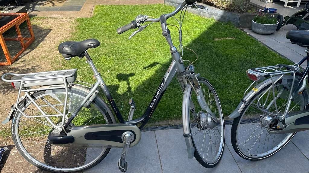 Twee Gazelle Orange fietsen, waarvan één elektrisch, Fietsen en Brommers, Elektrische fietsen, Ophalen, Gebruikt, Gazelle