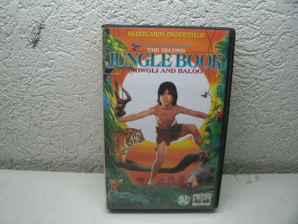 VHS 180A JUNGLE BOOK MOWGLI AND BALOO NED ONDERT, Cd's en Dvd's, VHS | Kinderen en Jeugd, Alle leeftijden, Ophalen of Verzenden