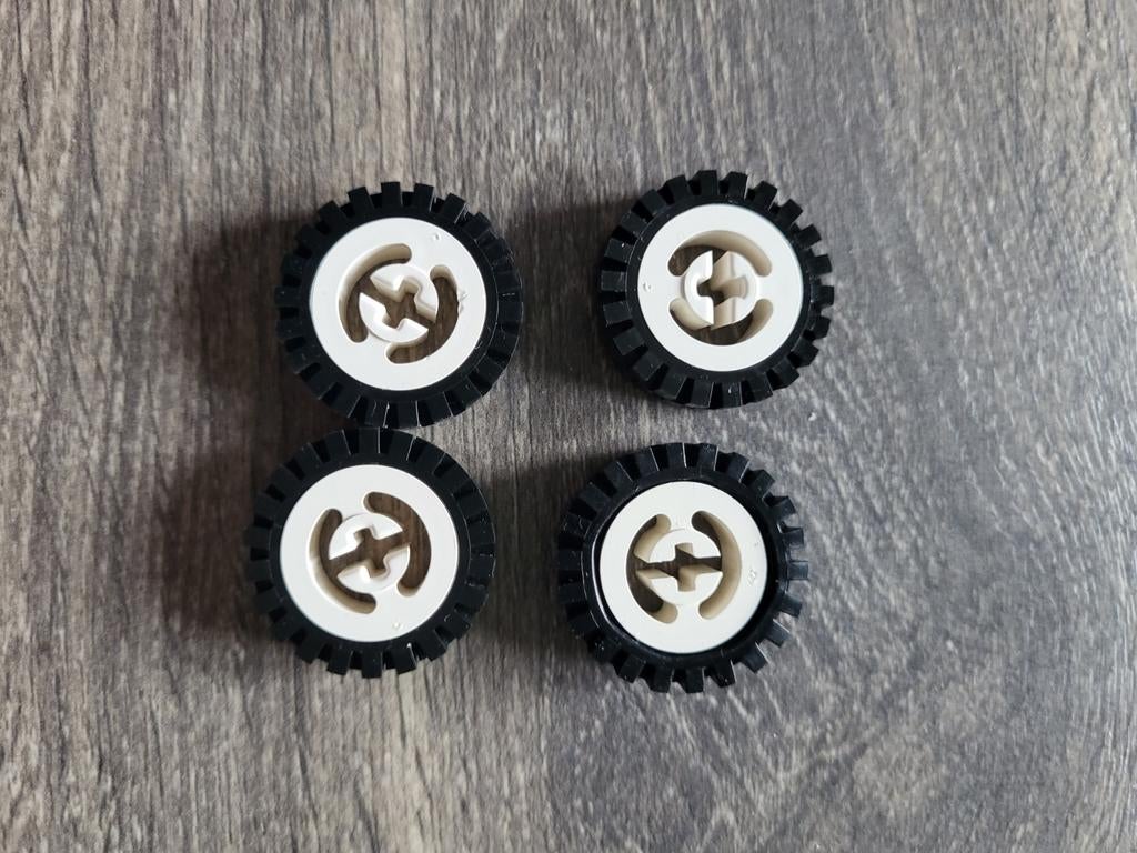 Lego Technic wielen wit met grof profiel zwarte band., Ophalen of Verzenden, Gebruikt, Losse stenen, Lego