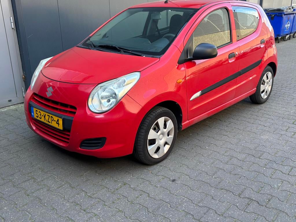 Suzuki Alto 1.0 2010 Rood apk 23-4-2027, Voorwielaandrijving, Stof, Elektrische ramen, 4 stoelen