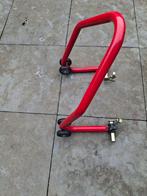 Motor (bike) lift / paddock standaard, Ophalen